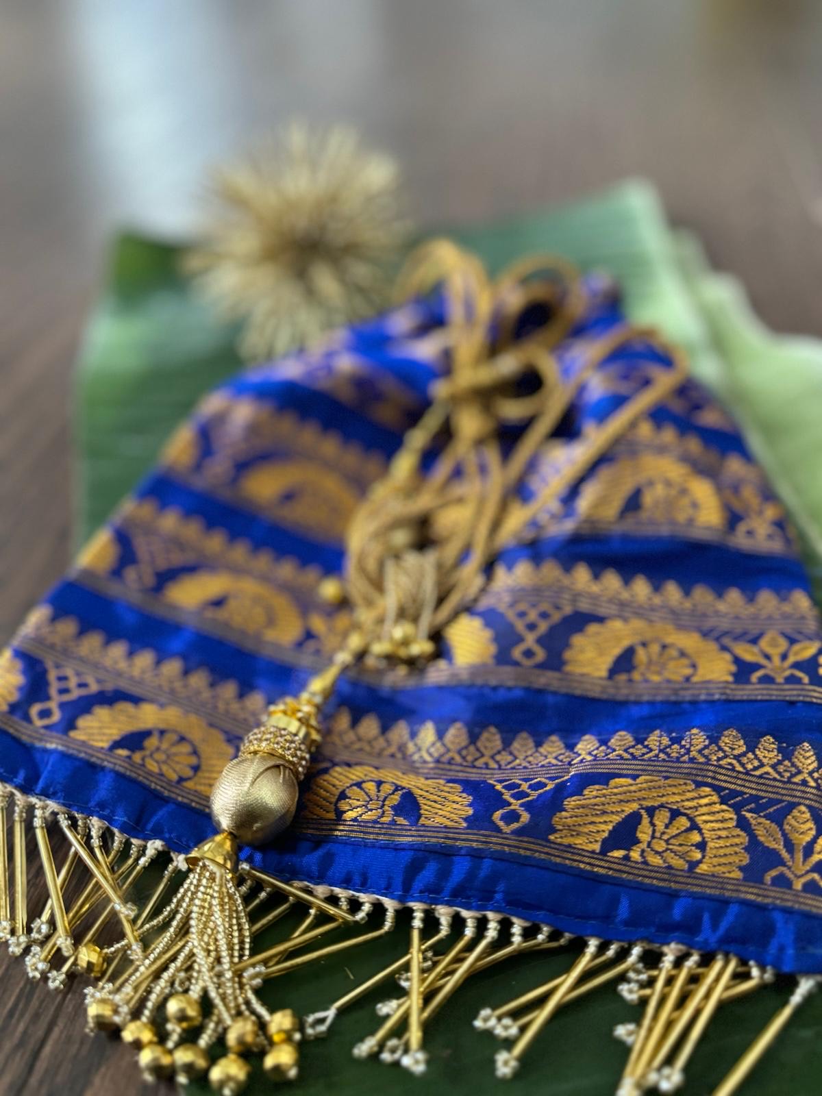 Royal Blue Assam Silk Potli Bag with golden thread work