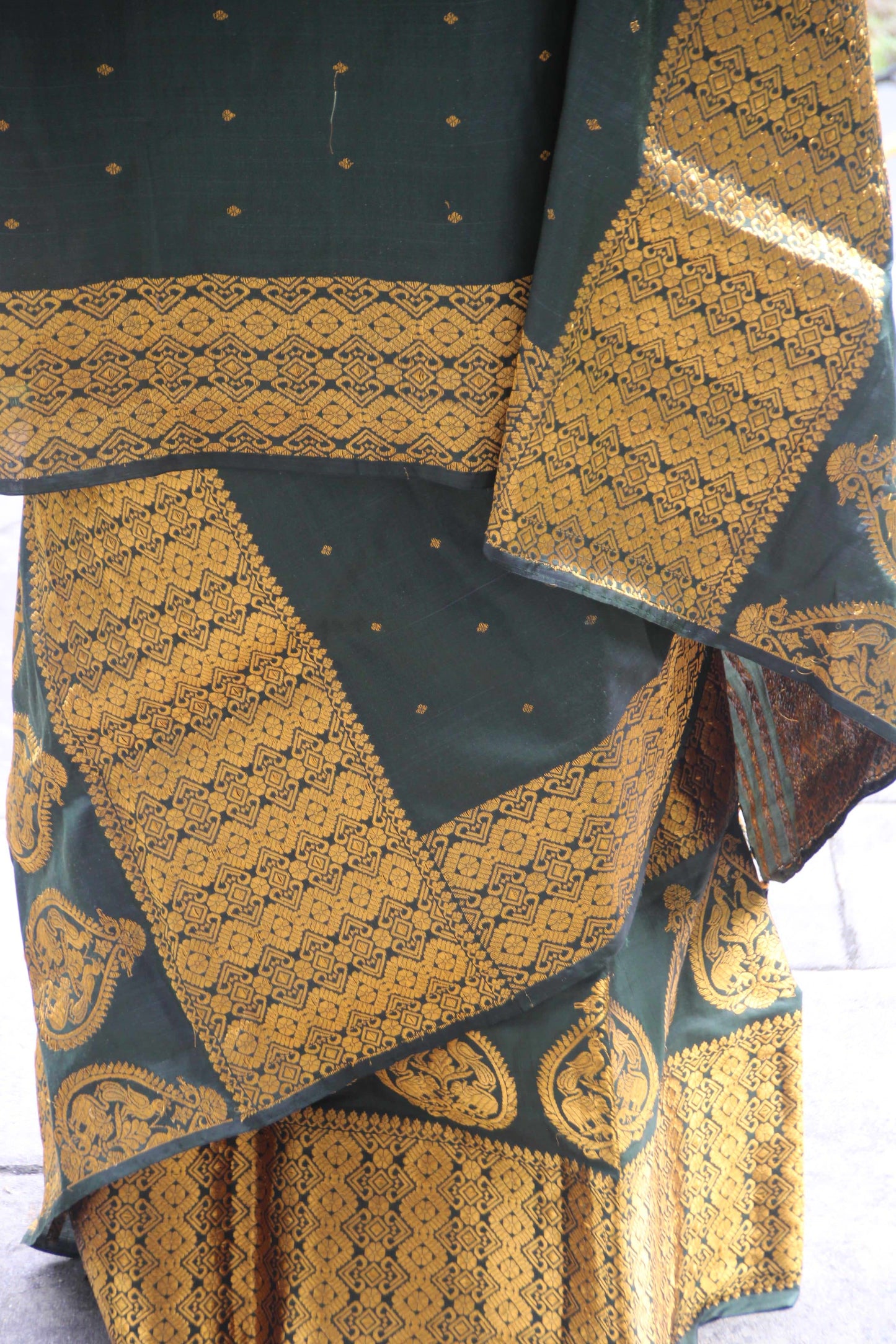 Assam silk bottle green mekhla chadar with thick woven border