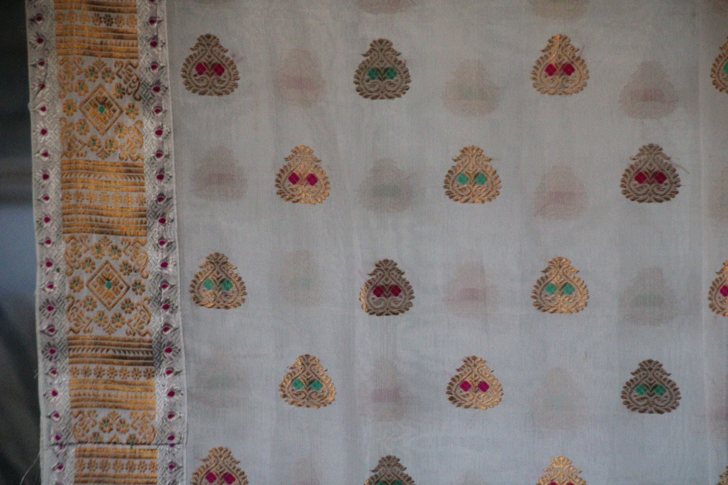 Pure silk white gold and silver work age old khinkhap motif mekhela chadar