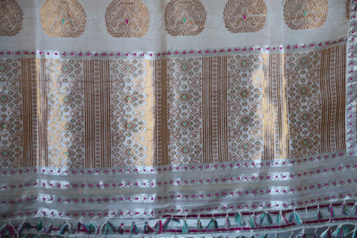 Pure silk white gold and silver work age old khinkhap motif mekhela chadar