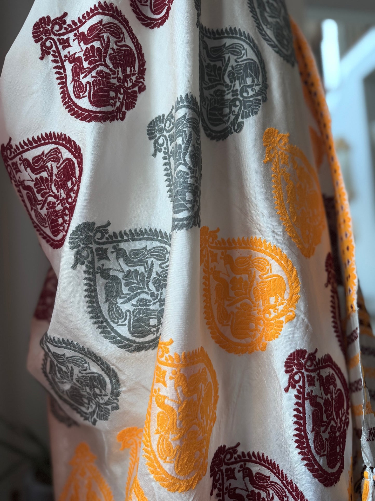 Assam Silk White saree in age old Khinkhap motifs in multi colors