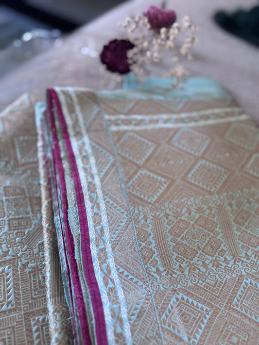 A pure mulberry silk or pat silk Mekhela Chadar